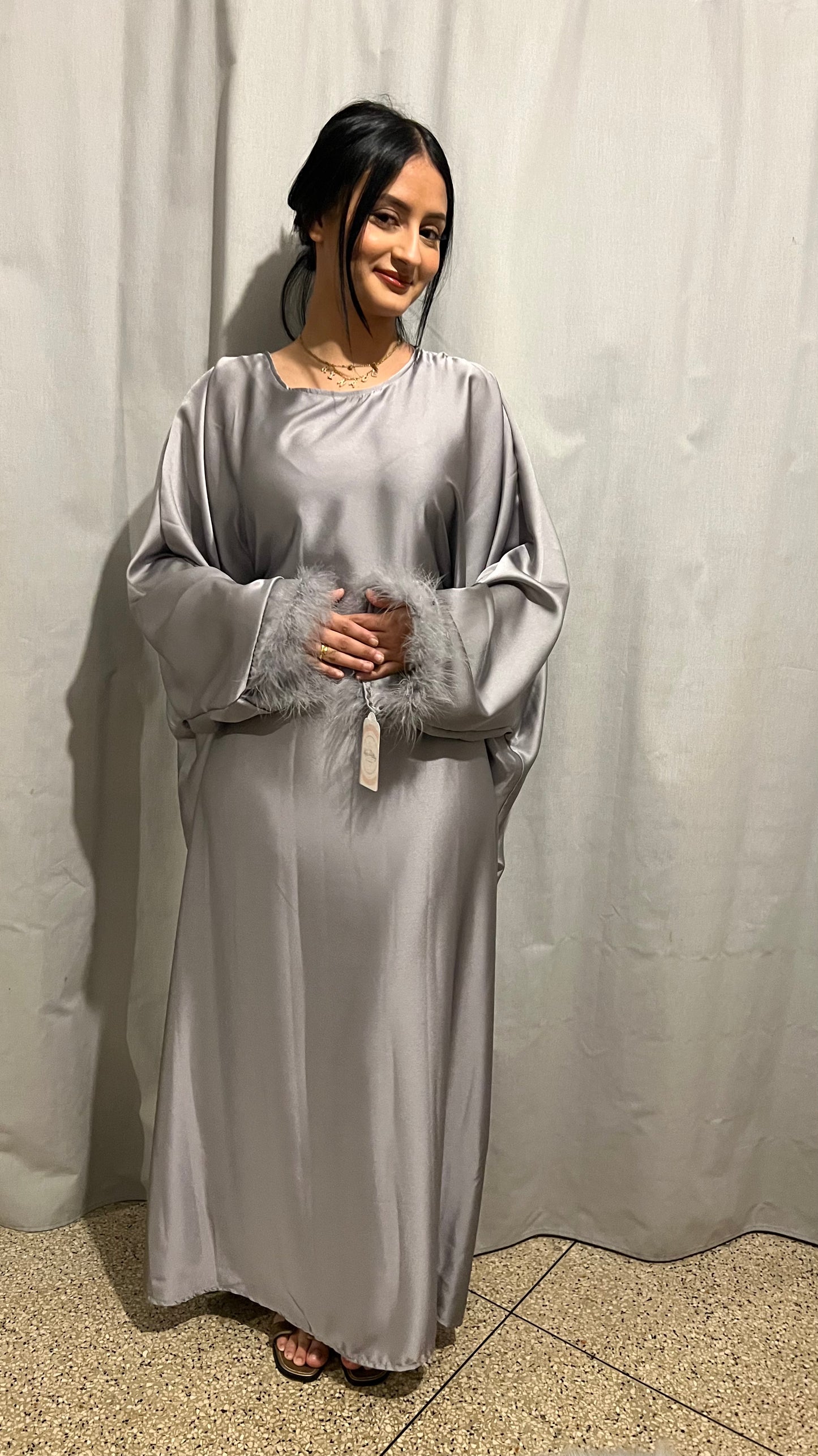 Robe à plumes cintrée