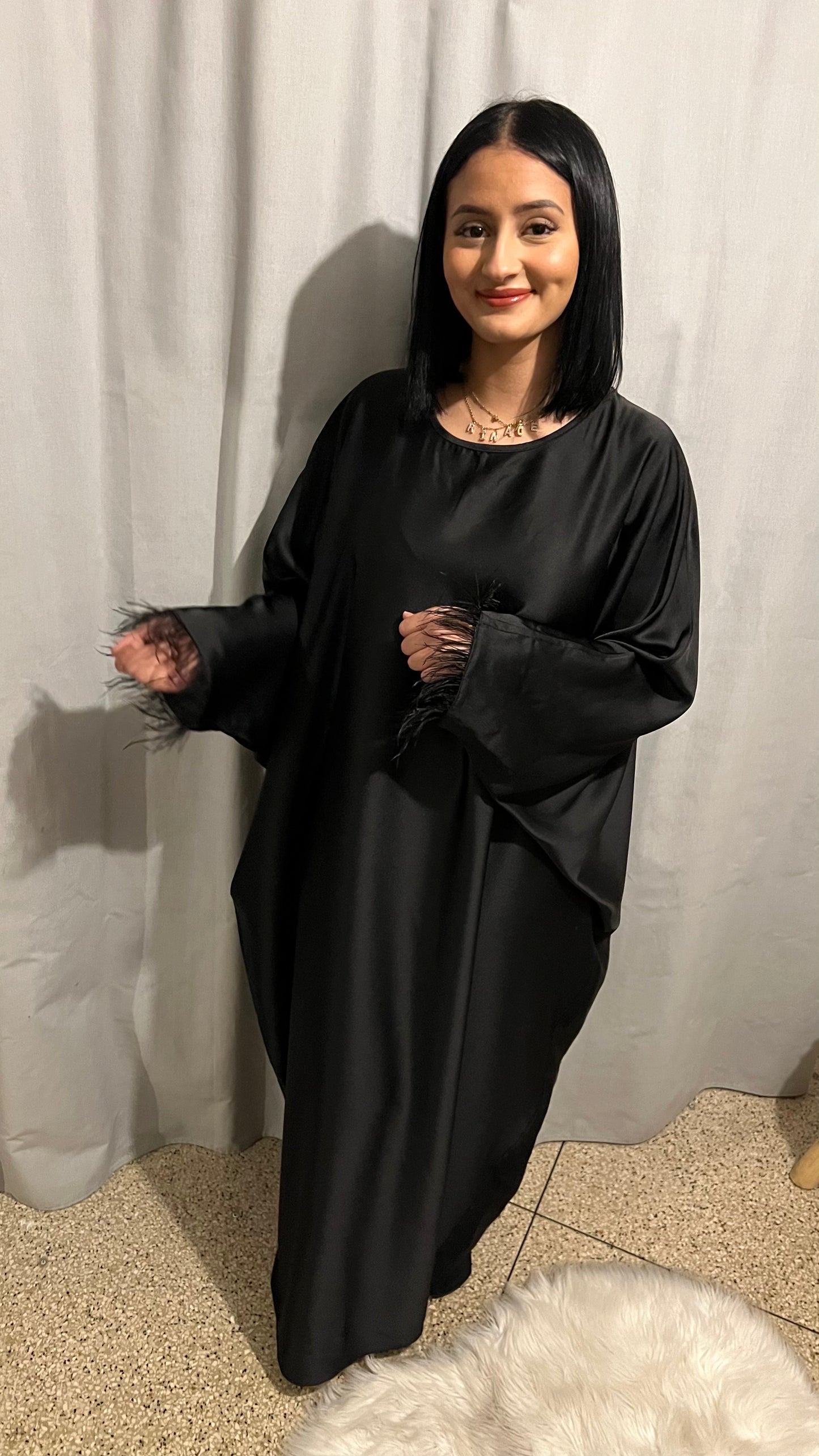 Robe à plumes ample