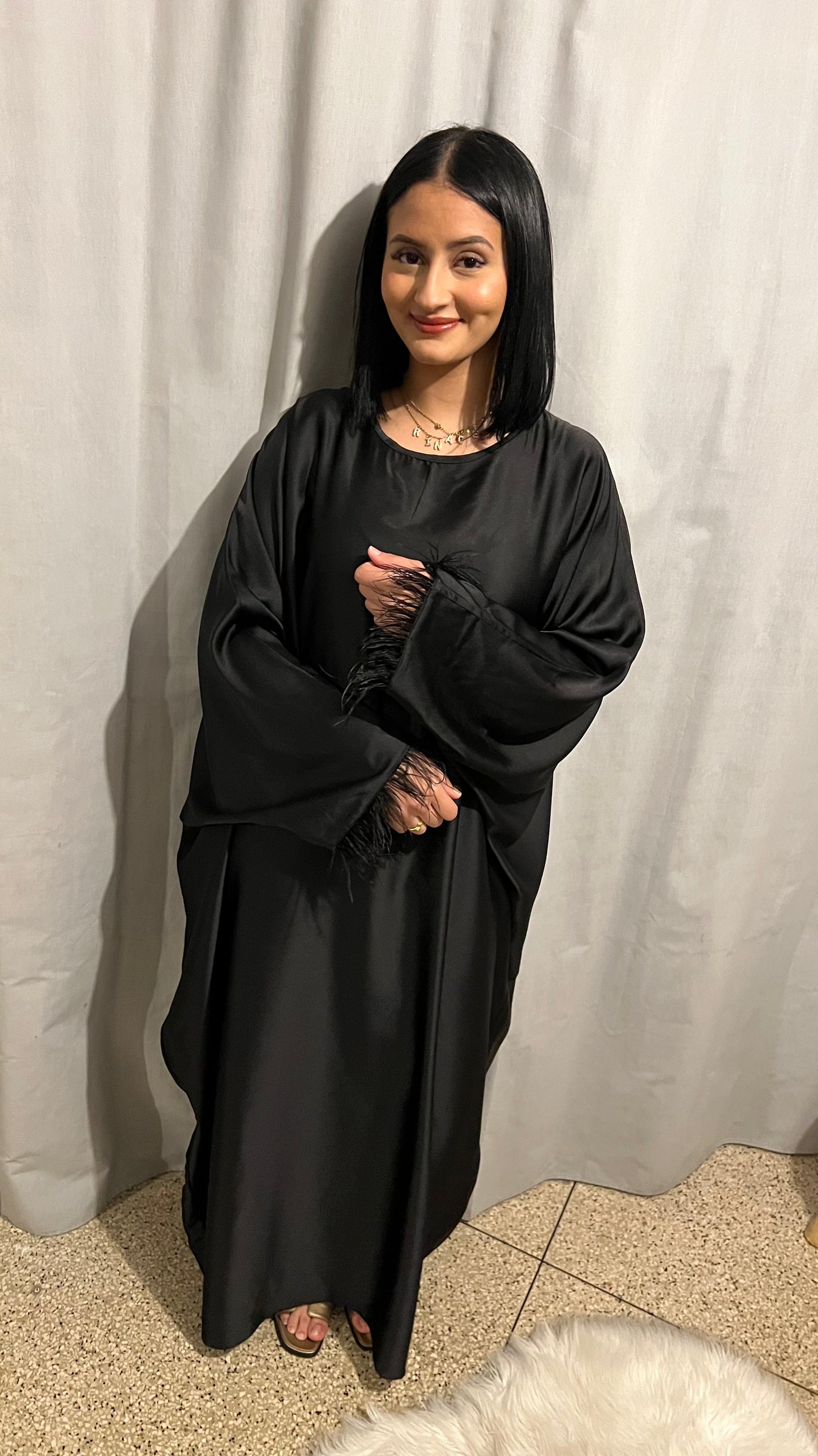 Robe à plumes ample